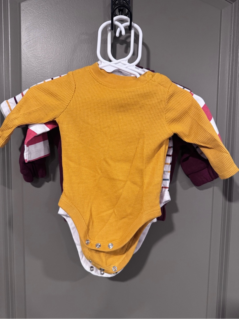 Curated lot of boys’ 0-3 month long sleeve bodysuit